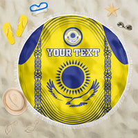 Round beach blanket with Kazakh flag design, blue fringe edge, center emblem and “YOUR TEXT”.