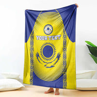 Draped Kazakhstan football blanket with blue border, yellow crest and “YOUR TEXT”