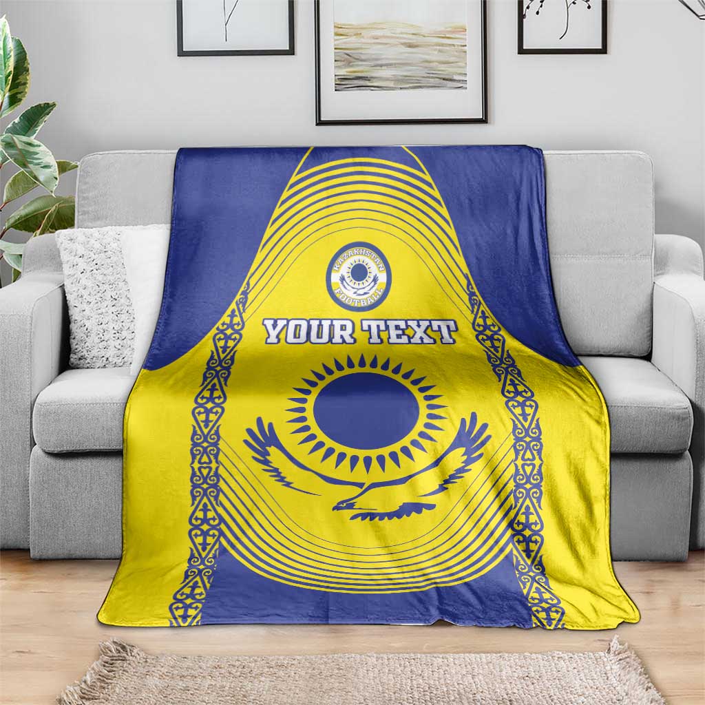 Kazakhstan football blanket on couch, blue-and-yellow center emblem with “YOUR TEXT”