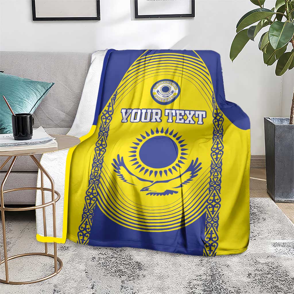 Kazakhstan football blanket on rug, blue-and-yellow crest design with “YOUR TEXT”