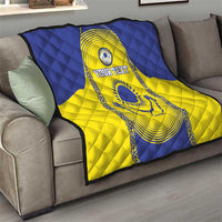 Custom Kazakhstan football quilt draped on a sofa, blue and yellow with “YOUR TEXT”