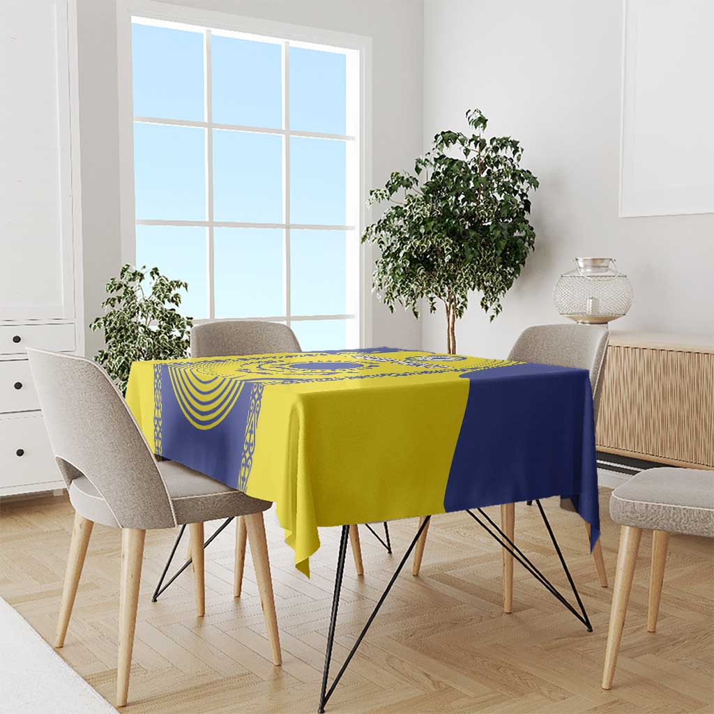 Square tablecloth with Kazakhstan flag colors, blue and yellow on a table