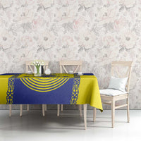 Printed Kazakhstan flag tablecloth in blue and yellow covering a dining table