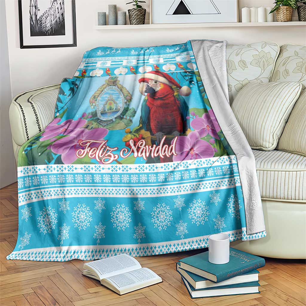 Blue Christmas blanket with red macaw in Santa hat, 'Feliz Navidad' lettering, floral snowflakes