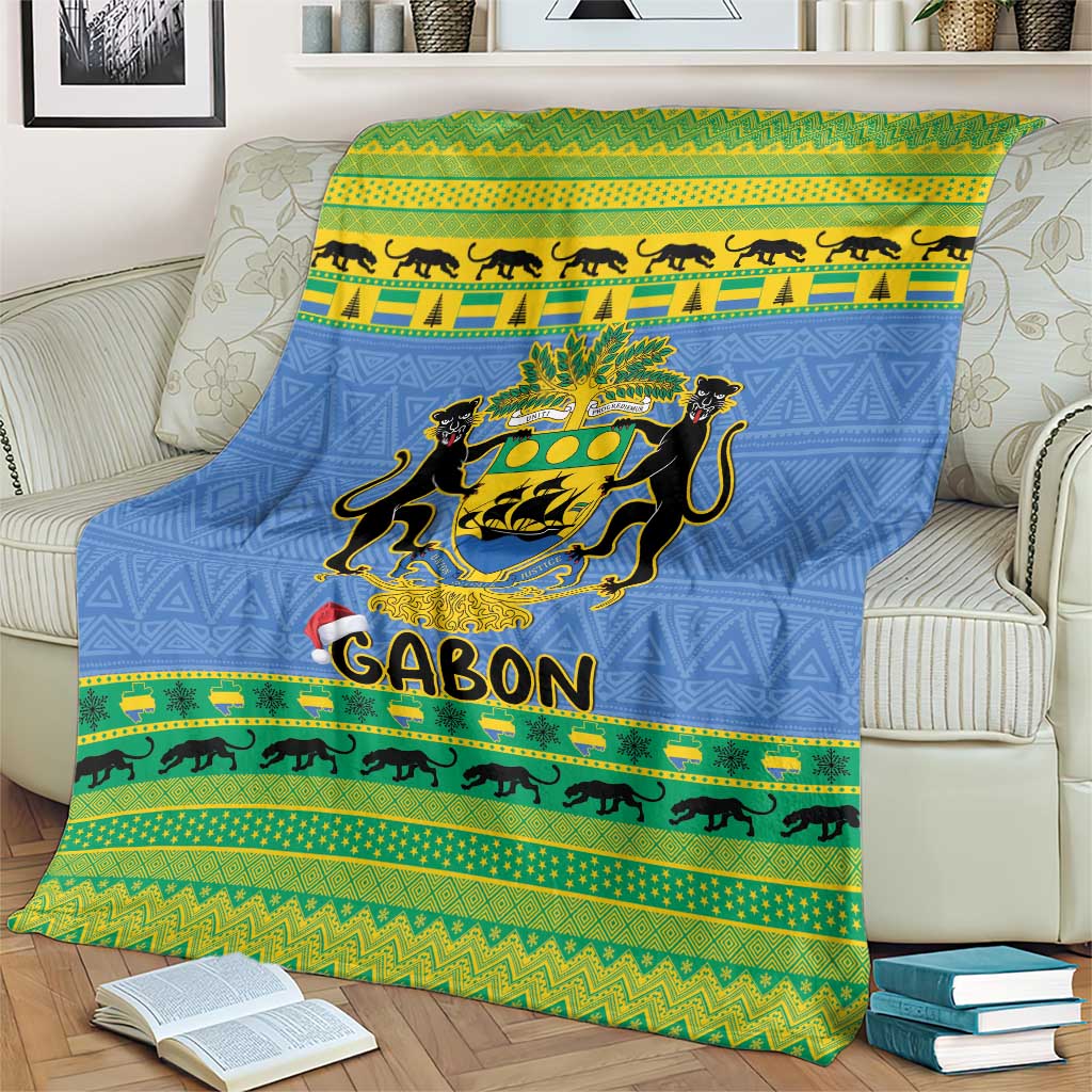 Blue Christmas blanket with coat of arms crest, 'GABON' text, and green-yellow striped trim