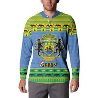 Blue and green Gabon crest button sweatshirt, long sleeves, worn on model