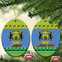 Two blue oval Gabon ceramic ornaments with coat of arms; Gabon and Joyeux Noel text
