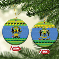 Blue round Gabon ceramic Christmas ornament set with coat of arms and Joyeux Noel text
