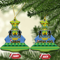 Blue Gabon ceramic bell ornaments with coat of arms; one shows Joyeux Noel text
