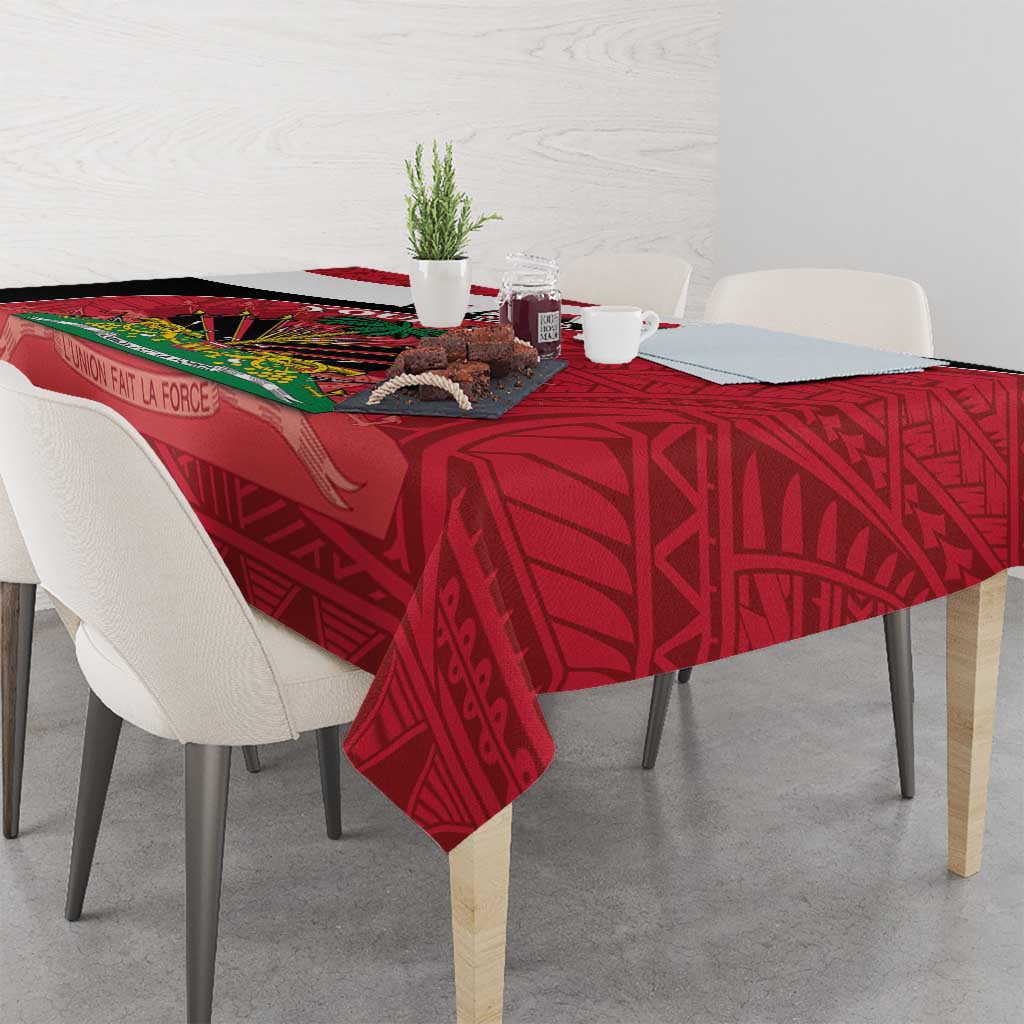 Red Haiti tablecloth with detailed emblem graphic and patterned border, covers dining table