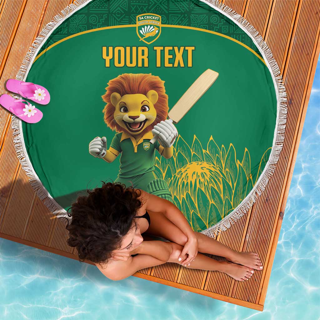 Green round beach blanket with lion cricket mascot, 'YOUR TEXT' and white tassel fringe