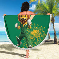 Green round beach blanket with lion cricket mascot, 'YOUR TEXT' design and white fringe trim