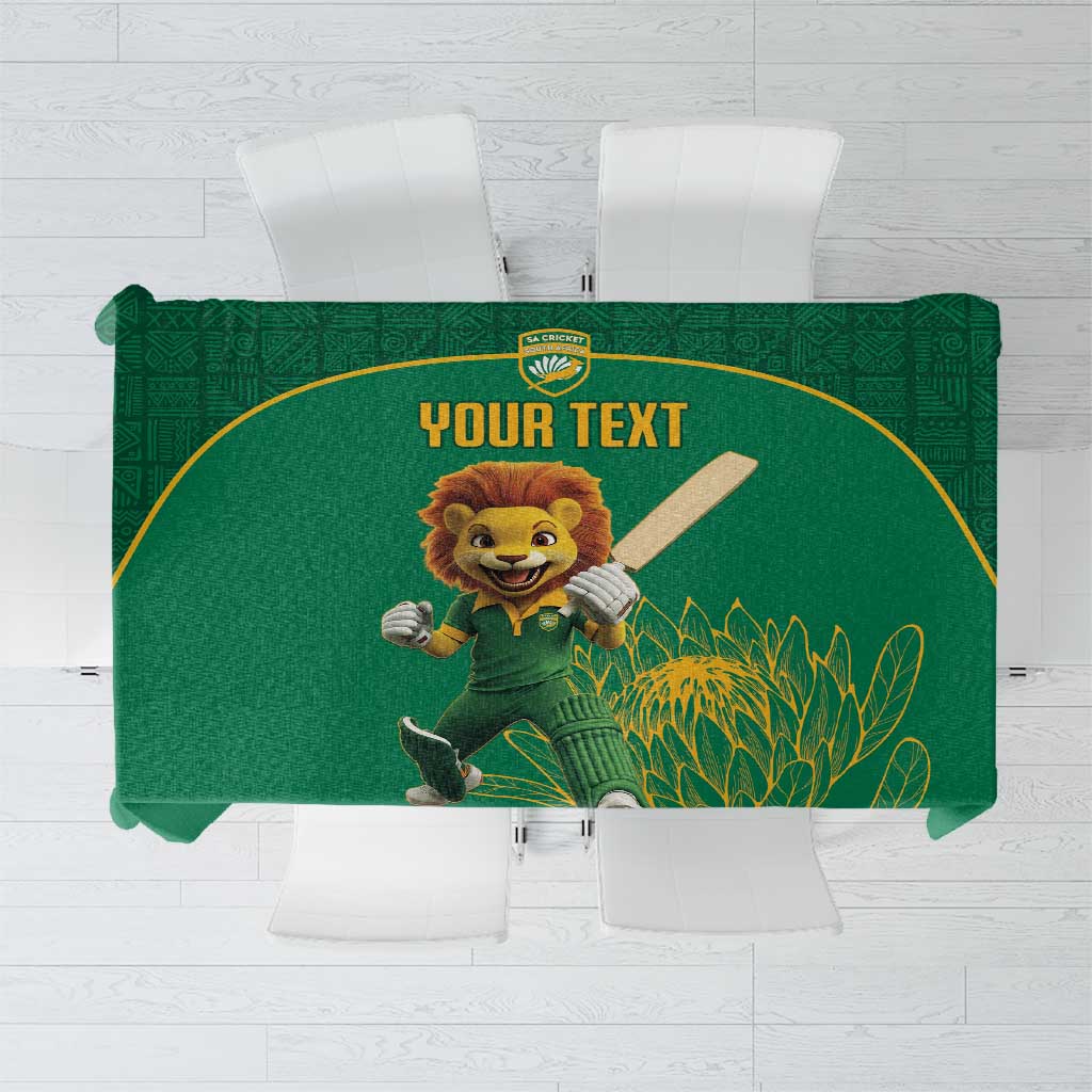 Green cricket tablecloth with lion mascot and gold floral protea design