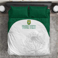 Green patterned bedding set with white duvet featuring floral outline and custom text