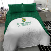 White duvet and green pillowcases with floral line art and custom text, green border