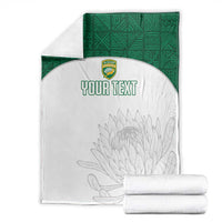 Custom cricket blanket set: white front with gray protea outline and crest; green reverse; YOUR TEXT