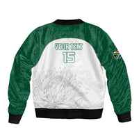 Bomber jacket back panel, green sleeves, white back with “YOUR TEXT 15” print.