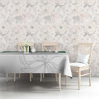 Cricket tablecloth on dining table with gray floral pattern and green border trim