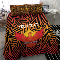 Orange and black duvet and pillow set featuring eagle emblem, geometric lines, Eastern Cape