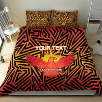 Orange and black bedding set with geometric maze print, eagle crest, and Eastern Cape