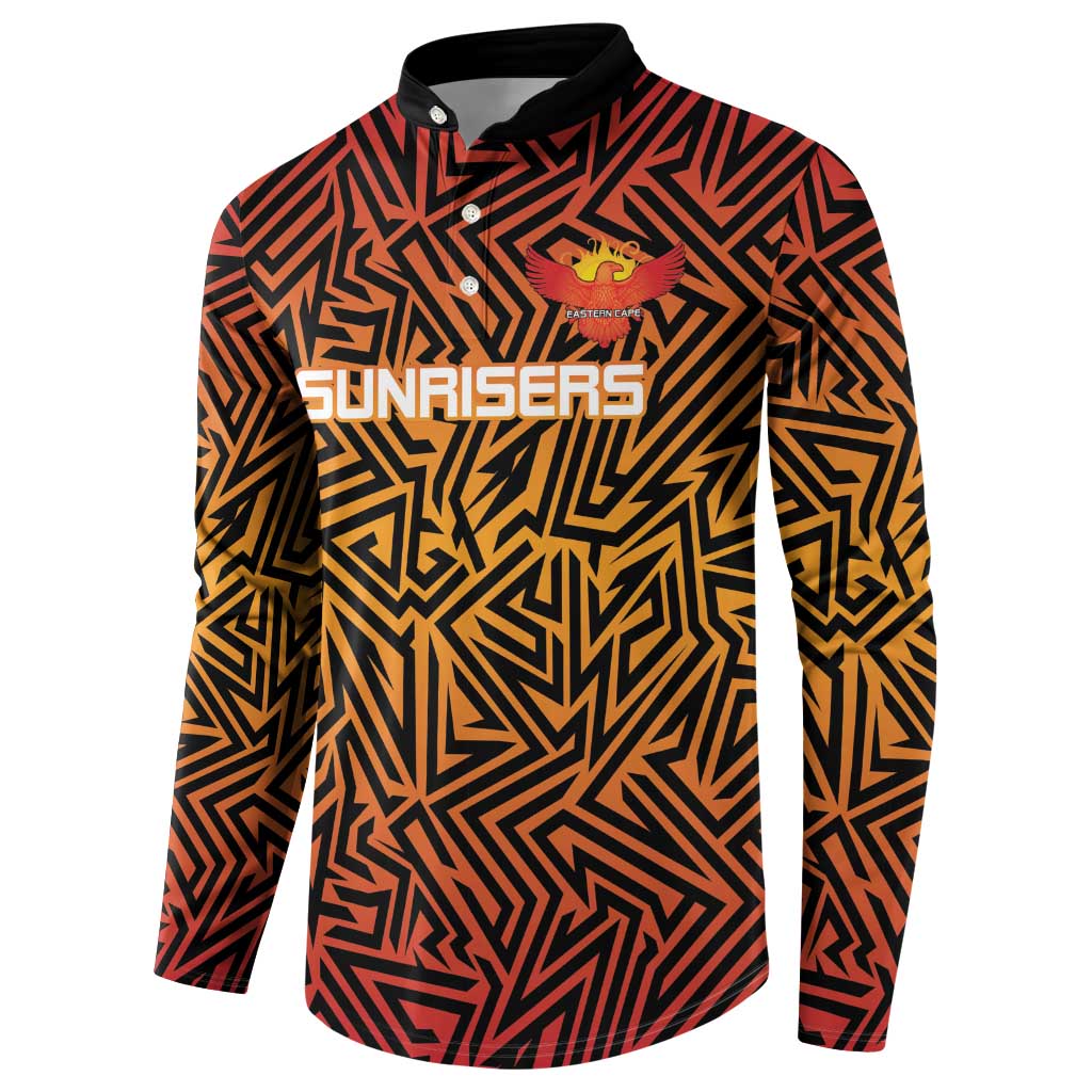 Orange and black patterned cricket sweatshirt with front buttons, stand collar, and chest logo.