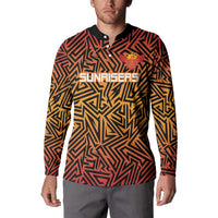 Orange and black patterned button-front cricket sweatshirt with 'SUNRISERS' graphic on chest.