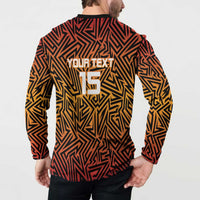 Back view of orange and black button cricket sweatshirt with 'YOUR TEXT' and 15.