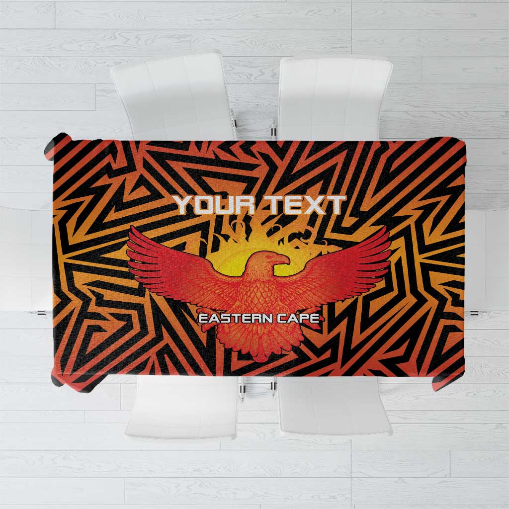 Custom orange tablecloth with black zigzag pattern, red bird graphic, and text