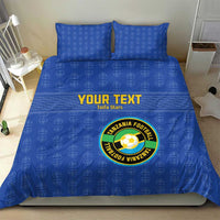 Blue bedding set with “YOUR TEXT” text and Tanzania Football circular logo on duvet.