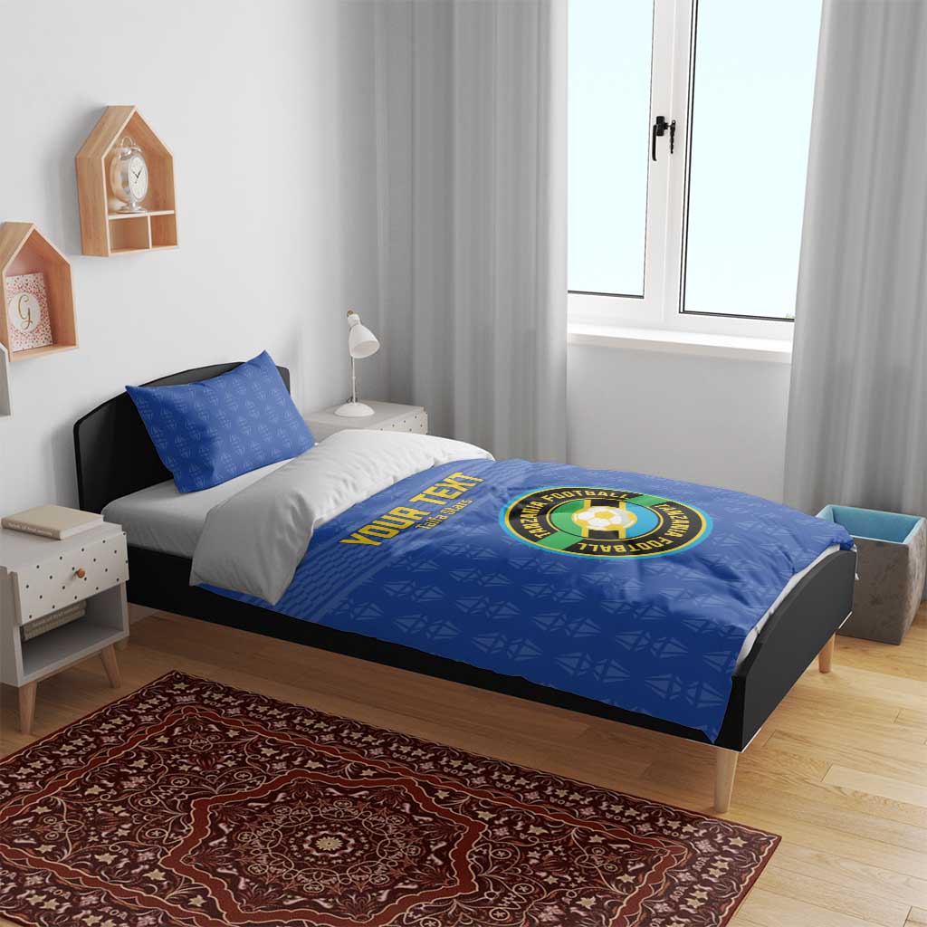 Blue duvet and pillowcases with Tanzania Football emblem and “YOUR TEXT” front panel.