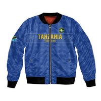 Blue bomber jacket with zip front, ribbed cuffs, and Tanzania front graphic badge