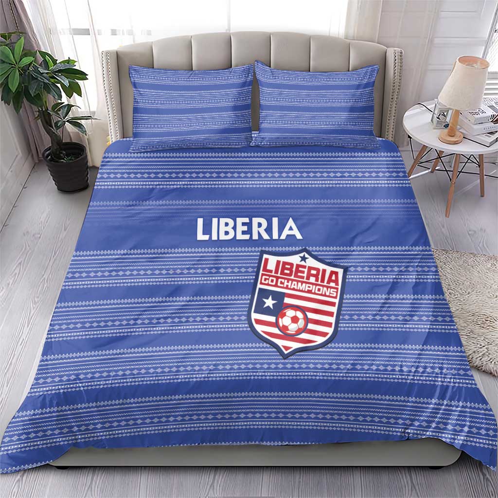 Blue striped bedding set with Liberia logo on duvet, two matching pillow shams