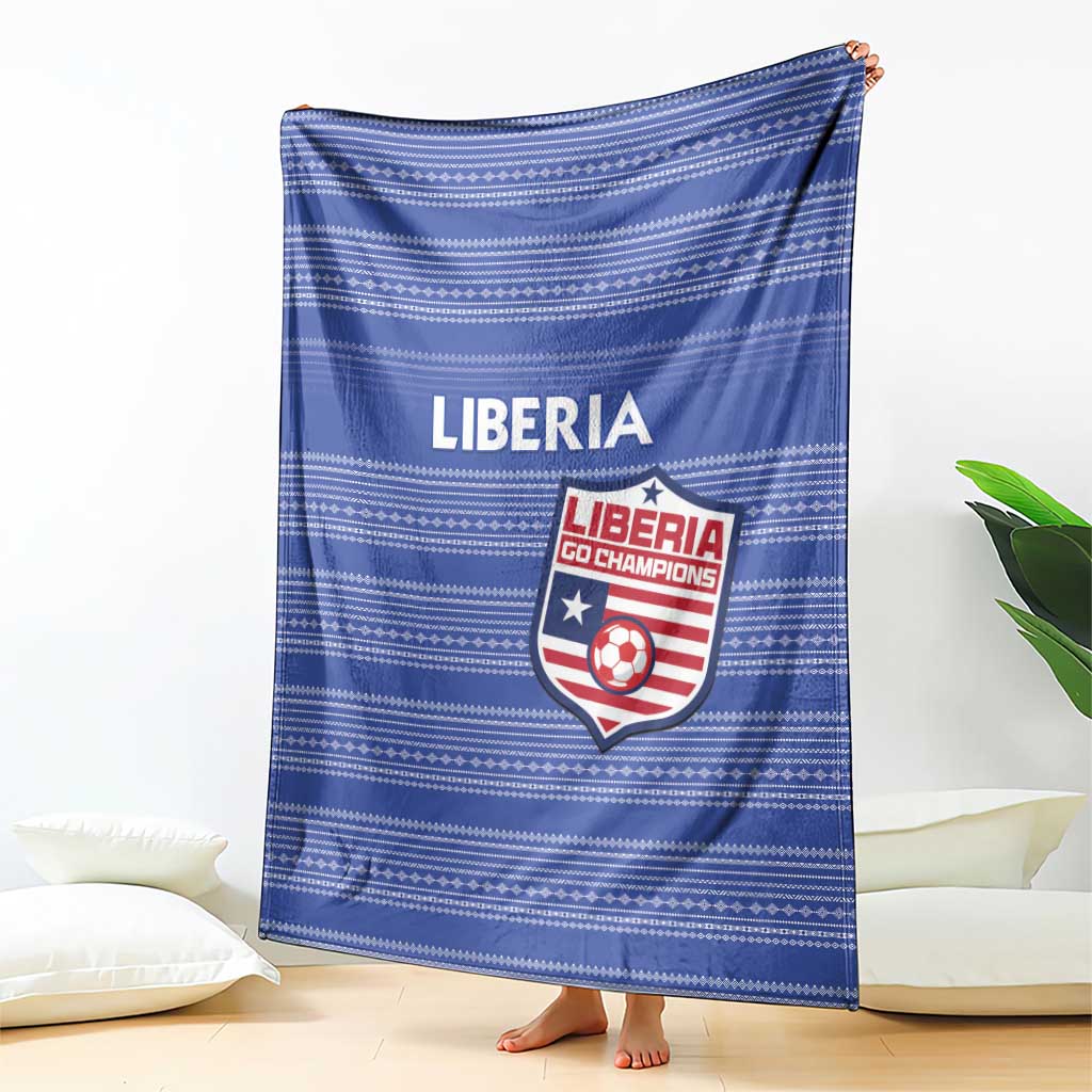 Blue football blanket with LIBERIA wordmark and Go Champions crest, striped design