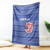 Blue football blanket with LIBERIA wordmark and Go Champions crest, striped design
