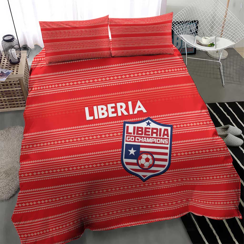 Red Liberia football bedding set with striped design; duvet and two pillows on bed