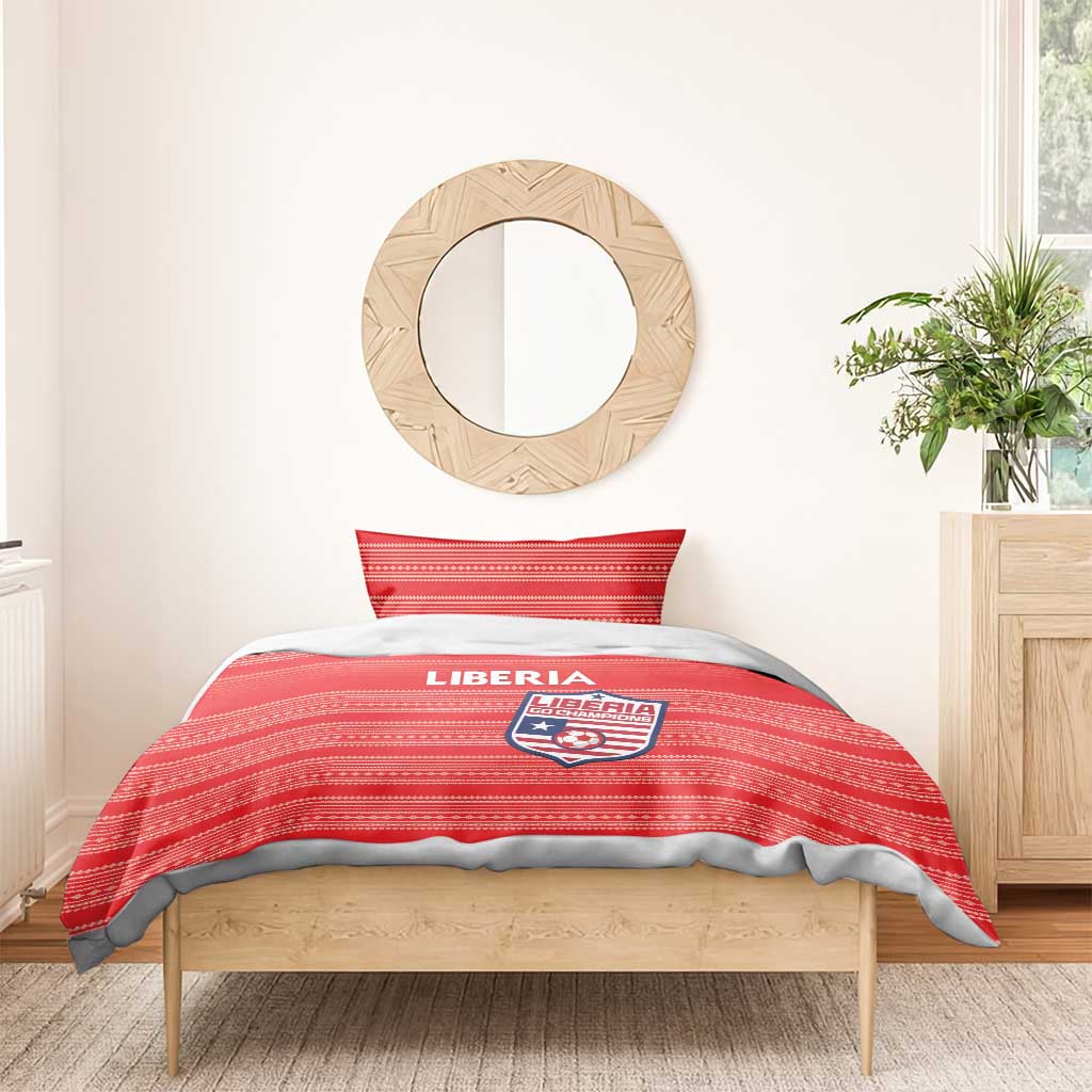 Red Liberia football bedding set with striped duvet and crest pillowcase on single bed