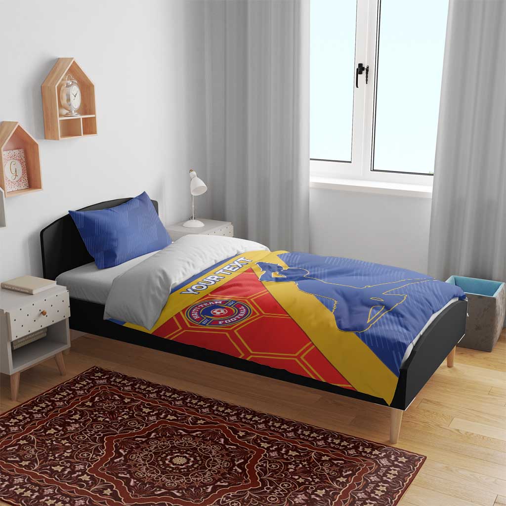 Blue football bedding set with Haiti logo, soccer silhouette, and matching pillowcases