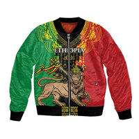 Red and green African patterned bomber jacket with lion emblem, full zip, black ribbed cuffs