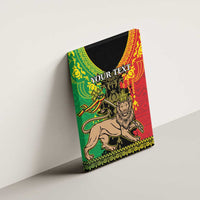 Canvas wall art with Lion of Judah illustration in green, red, and black and “YOUR TEXT”