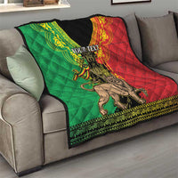 Personalized Ethiopia quilt blanket on sofa, green and red lion of Judah graphic with black center