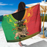 Red and green Lion of Judah sarong with 'YOUR TEXT' and gold border trim