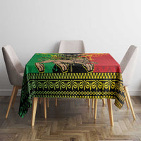 Ethiopia tablecloth with Lion of Judah and geometric border, green and red on round table