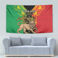 Red and green Lion of Judah tapestry with crowned lion graphic and 'YOUR TEXT' text.