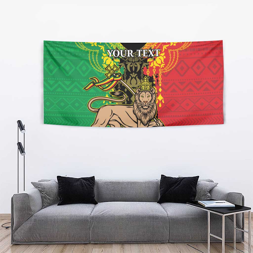Crowned lion Lion of Judah tapestry in green and red with geometric borders and 'YOUR TEXT'.