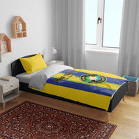 Yellow and blue Tanzania football bedding set with custom text and football crest on duvet
