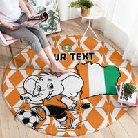 Orange oval round carpet rug featuring elephant playing football and custom text