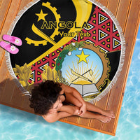 Black round beach blanket with white fringe, Angola coat-of-arms and red geometric accents