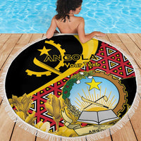 Black round beach blanket with white fringe, Angola emblem and green laurel details