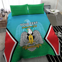Personalised bedding set with teal duvet and green pillowcases, coat-of-arms graphic and side stripes