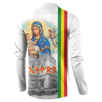 White sweatshirt back with Virgin Mary holding baby, church print, Ethiopian flag stripe